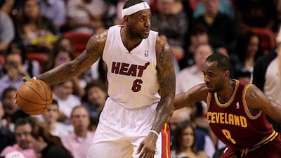 LeBron James is shadowed by Christian Eyenga during Monday night’s victory for Miami Heat over the Cleveland Cavaliers.