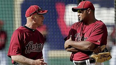 The major league is new territory for Brad Mills, the Houston Astros manager, left.