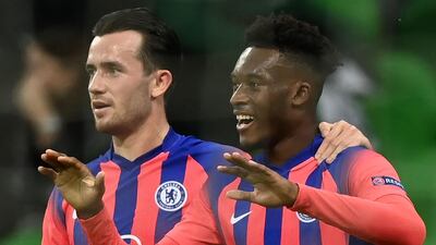 Chelsea's English midfielder Callum Hudson-Odoi celebrates with teammates after scoring the opening goal in the UEFA Champions League match against Krasnodar . AFP
