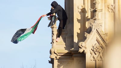 Big Ben's Palestinian flag protest lasted 17 hours before a cherry picker was brought in to end the stunt. AP