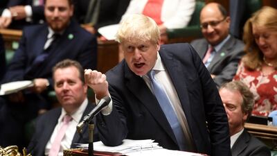 UK Prime Minister Boris Johnson speaks during the weekly Prime Minister's Questions session in the House of Commons. AFP / UK Parliament