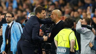 Manchester City manager Pep Guardiola and Tottenham manager Mauricio Pochettino after the match. Reuters
