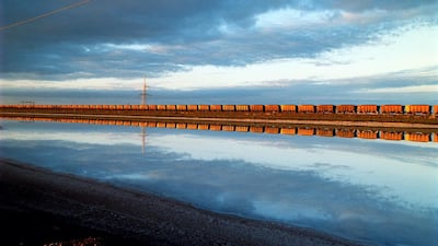 A train on the Rio Tinto-owned Hamersley River railway takes iron ore from the town of Tom Price to Dampier port in Western Australia. Michele Mossop / Fairfax Media via Getty