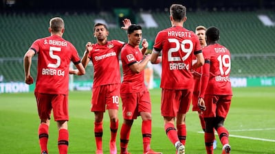 Kai Havertz, third right, celebrates with teammates after scoring against Werder Bremen. EPA