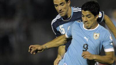 Luis Suarez shown during a World Cup qualifier on October 15, 2013. Matilde Campodonico / AP