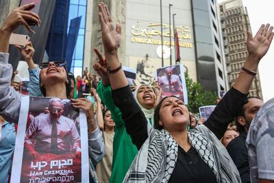 Protesters shout pro-Palestinian and anti-Israel slogans during a rally outside Egypt's Journalists' Union in central Cairo on Wednesday. Bloomberg