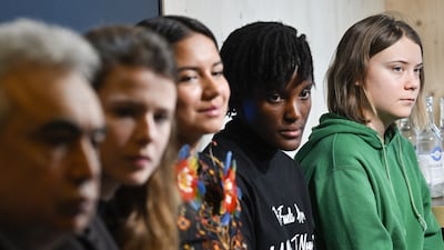 Climate activists Greta Thunberg of Sweden, Vanessa Nakate of Uganda, Helena Gualinga of Ecuador, Luise Neubauer of Germany, and Fatih Birol, Head of the International Energy Agency, attend to a press conference on the set of CNBC, on the sideline of the World Economic Forum, WEF, in Davos. EPA