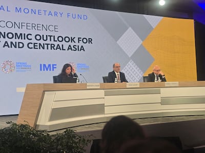 Jihad Azour, centre, director of the IMF’s regional department, during a media conference in Washington. Salim A Essaid / The National