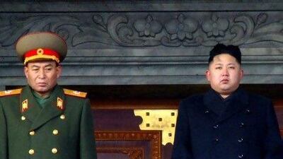 Kim Jong-Un (right) and North Korea's army chief Ri Yong-Ho attend the mourning service for late North Korea leader Kim Jong-Il in Pyongyang. Ri Yong-Ho has been removed from all his posts.