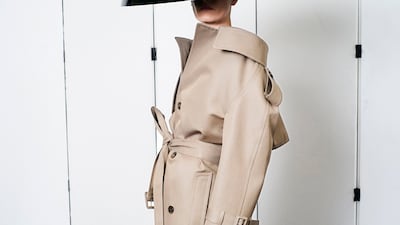 A trench coat was recut into an elegant Balenciaga dress with a wide neckline.