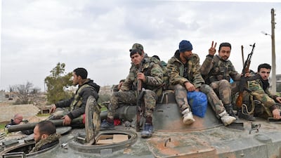 Syrian army soldiers advance in Tall Touqan village, in Syria's northwestern Idlib province, about 45 kilometres southwest of Aleppo AFP