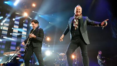 Charlie Burchill, left, and Jim Kerr of Simple Minds perform at the O2 Arena in London last November. Jim Dyson / Getty Images