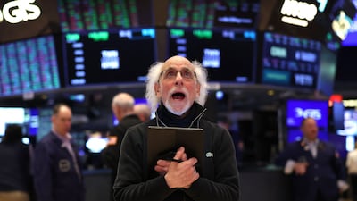 Trader Peter Michael Tuchman waits for the closing bell on April 11's session of the New York Stock Exchange. AFP