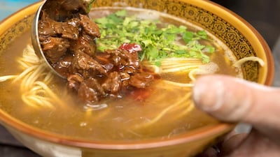 Braised beef with brown sauce noodles at Dragon Bao Bao Cafeteria in Abu Dhabi. Chris Whiteoak / The National
