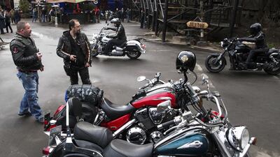 Members of Russia’s Night Wolves biker club arrive for a concert in Moscow on April 23, 2015. Pavel Golovkin / AP Photo