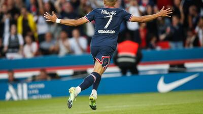 Kylian Mbappe celebrates after scoring his first goal against Metz at the Parc des Princes. EPA