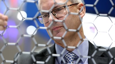 James Baker, chief executive of Graphene@Manchester, with a model designed to represent the structure of the 'wonder material'. Chris Whiteoak / The National