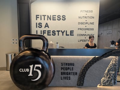 Club 15 comprises gym floors, padel courts and a swimming pool. Hayley Kadrou / The National