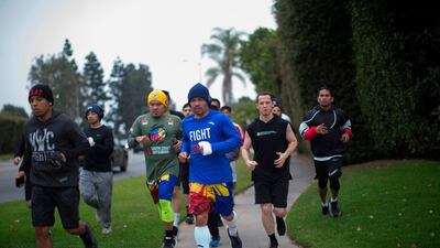 Manny Pacquiao jogs in the morning with fans and friends in Los Angeles. AFP