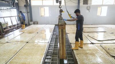 Small ice blocks -- 100 centimetres x 16 cm x 17 cm -- are produced for non-food grade and food-grade purposes. These 25 kilogram blocks are edible and safety certified. Produced in steel moulds, they were first made for the fishing industry but their use now runs from construction to chilling swimming pools in the hot summer months. Antonie Robertson / The National