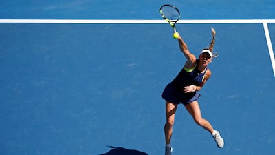 Caroline Wozniacki hits a shot in her semi-final match against Elise Mertens of Belgium. Toru Hanai / Reuters