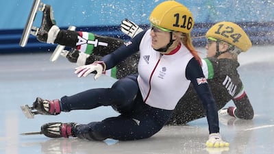 Elise Christie of Great Britain, front, and Arianna Fontana of Italy crash out as they compete in the women's 500-metre short track speedskating final on Thursday. Ivan Sekretarev / AP Photo