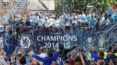 Crowds of supporters cheer a bus carrying the Chelsea Football Club soccer team as the team held a victory parade in west London, Britain, 25 May 2015. The team displays the Premiership and League Cup trophies that they have won this season. EPA/WILL OLIVER