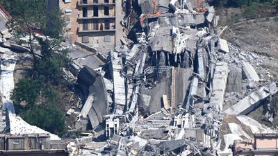 The demolition of the large towers '10' and '11' of the Morandi bridge using micro-explosive charges, in Genoa, northern Italy. EPA