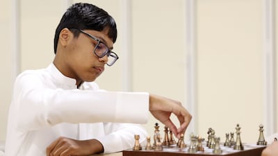 Eissa Sultan, 12, plays chess