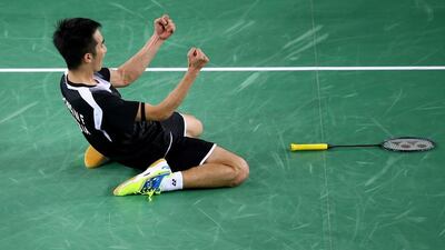 Malaysia’s Chong Wei Feng celebrates a win in the men’s singles badminton on Monday. Richard Heathcote / Getty Images