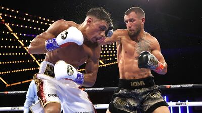Vasiliy Lomachenko, right, outpointed Jamaine Ortiz to win their lightweight bout at the Hulu Theater at Madison Square Garden. Getty