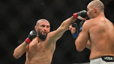 Khamzat Chimaev, left, fights Sean Strickland during UFC 328. Imagn