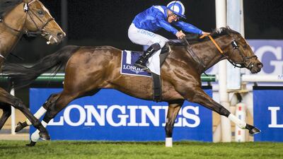 Jim Crowley and Ertijaal race to victory at the Dubai World Cup Carnival meeting at Meydan. Erika Rasmussen for The National