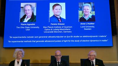 A panel announces the winners of the 2023 Nobel Prize in Physics, in Stockholm. AP