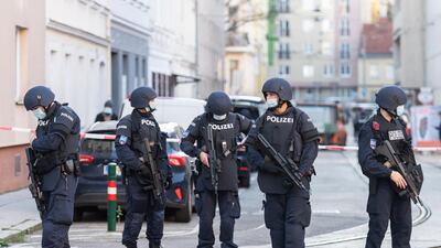 Armed police raid a mosque in Vienna. EPA