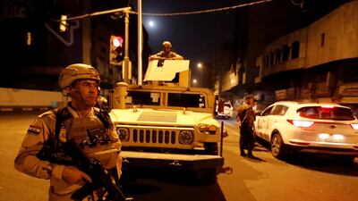 Iraqi soldiers patrol in Baghdad. Government attempts to curb corruption have met with repeated pushback. Reuters