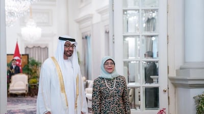 President Sheikh Mohamed meets Halimah Yacob, President of Singapore, during his official visit to the country in 2019. Photo: Sheikh Mohamed bin Zayed/Twitter