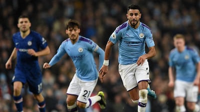 Manchester City's Algerian midfielder Riyad Mahrez runs with the ball. AFP