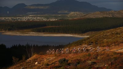 The lead peloton races during the 113 kilometer Stage 1 of the Absa Cape Epic mountain bike race in Oak Valley, South Africa on Monday. Nic Bothma / EPA