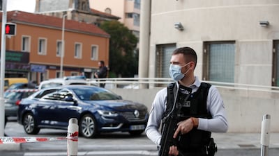 Police stand guard at the scene in Cannes, southern France. EPA