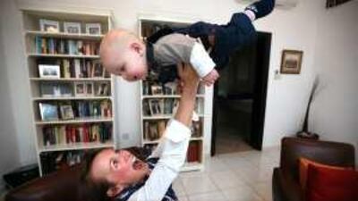 Ros Alston with her son, Rex. Ms Alston took time off without pay to add to her maternity leave.