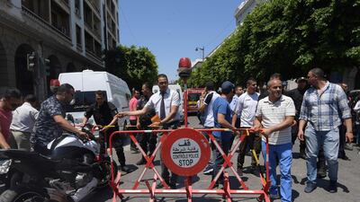 Tunisian security forces cordon off the site of an attack in the Tunisian capital's main avenue Habib Bourguiba. AFP
