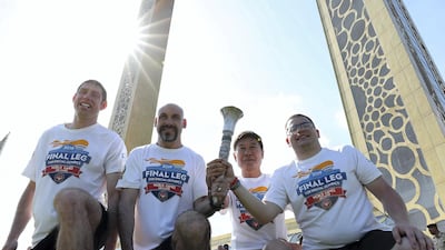 Left to right – Stephen Graham, Paul Asaro, Lo-Hyun Park, official and Chief Secretary of Korean Freedom Federation, Zechariah Tietz. Pawan Singh / The National