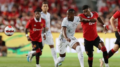 Isaac Mabaya of Liverpool competes with Marcus Rashford of Manchester United. Getty