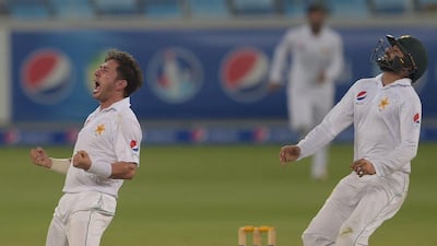 The seminal moment of the West Indies innings as Yasir Shah celebrates the wicket of Darren Bravo. Aamir Oureshi / AFP