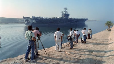 The USS Eisenhower making its way through the Suez Canal to join other warships in August 1990. AFP