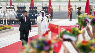 Sheikh Mohamed bin Zayed, Crown Prince of Abu Dhabi and Deputy Supreme Commander of the Armed Forces, is received by Chinese President Xi Jinping during a visit to Beijing in 2019. Mohamed Al Hammadi / Ministry of Presidential Affairs