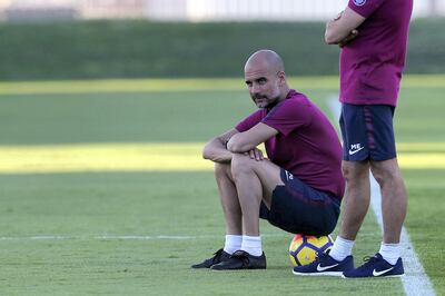 Manchester City manager Pep Guardiola faces having to get his side past Liverpool in the quarter-finals of the Uefa Champions League. Chris Whiteoak / The National