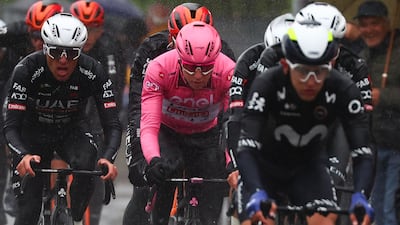 UAE Team Emirates' Tadej Pogacar rides in the peloton during Stage 16. AFP