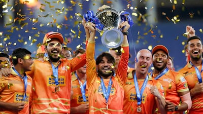 CP Rizwan, second left, celebrates with his teammates after Gulf Giants won the ILT20. Photo: Vipin Pawar / CREIMAS